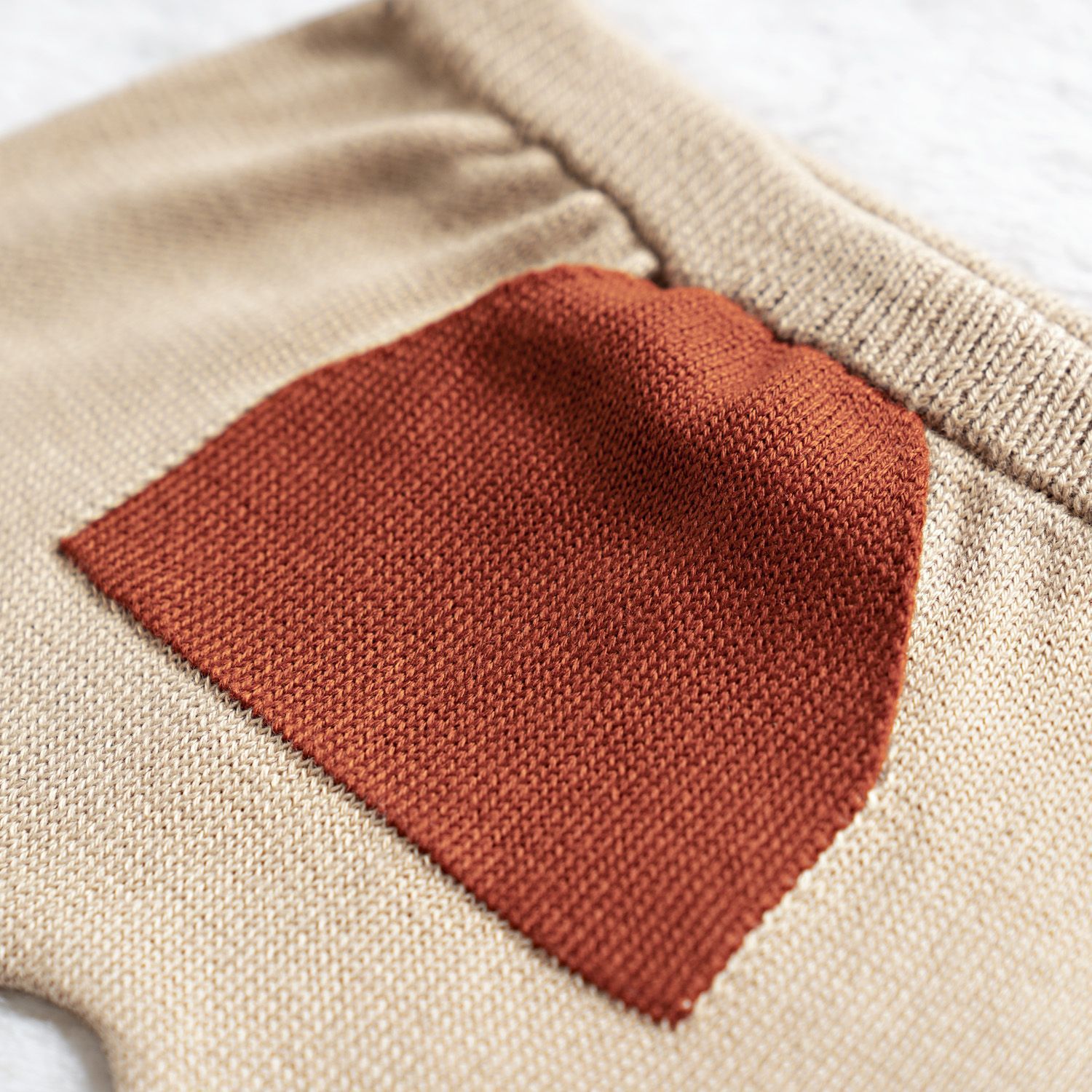 Calça Bebê Saruel Tricot com Bolsinho Bege e Off White