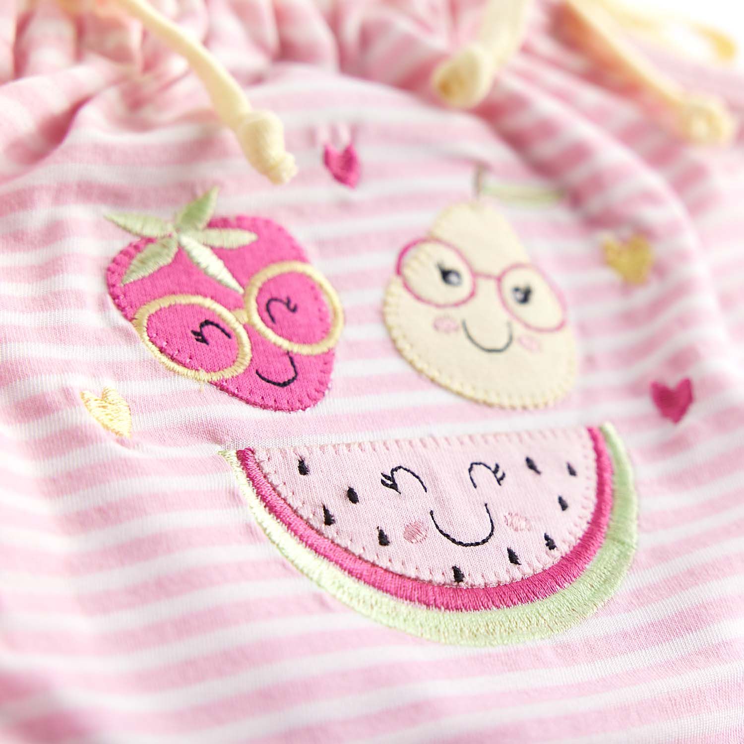 Macacão Curto Frutinhas Listrado Rosa